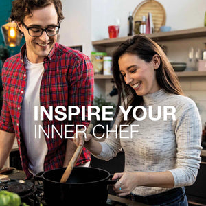 
                  
                    Load image into Gallery viewer, couple in the kitchen stirring a pan
                  
                