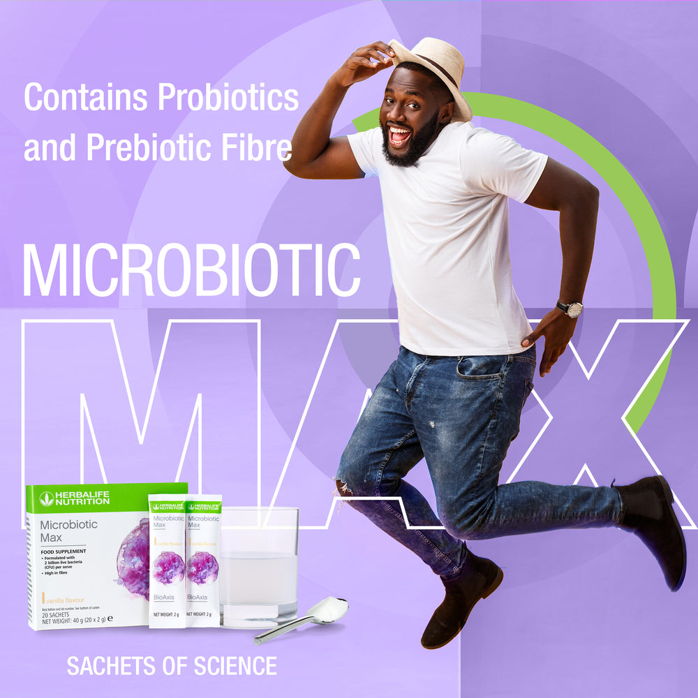 
                  
                    Load image into Gallery viewer, Energised and happy man in jeans and white T Shirt with a hat next to Herbalife Nutrition Microbiotic Max box and sachets
                  
                
